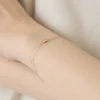 Helena Rohner Goldperlenarmband