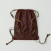 Kate Sheridan Rucksack aus gewachster Baumwolle mit Schleife Kate Sheridan Rucksack aus gewachster Baumwolle mit Schleife