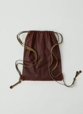 Kate Sheridan Rucksack aus gewachster Baumwolle mit Schleife Kate Sheridan Rucksack aus gewachster Baumwolle mit Schleife