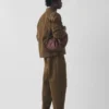 Kate Sheridan Rucksack aus gewachster Baumwolle mit Schleife Kate Sheridan Rucksack aus gewachster Baumwolle mit Schleife