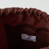 Kate Sheridan Rucksack aus gewachster Baumwolle mit Schleife Kate Sheridan Rucksack aus gewachster Baumwolle mit Schleife