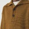 Pullover aus Wolle mit halber Knopfleiste Pullover aus Wolle mit halber Knopfleiste