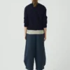 Strickjacke mit aufgesetzten Taschen aus Wolle und Leinen Strickjacke mit aufgesetzten Taschen aus Wolle und Leinen