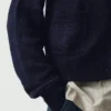 Strickjacke mit aufgesetzten Taschen aus Wolle und Leinen Strickjacke mit aufgesetzten Taschen aus Wolle und Leinen